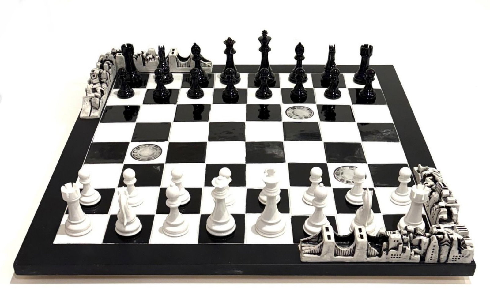 Charles Fazzino- Chess Set: Artist: Charles Fazzino. Medium: Chess Set. Size: 26" x 26". Signature: Hand signed. Additional: The Chess board is an original Fazzino product the chess pieces are aftermarket. Reference#: 33300.