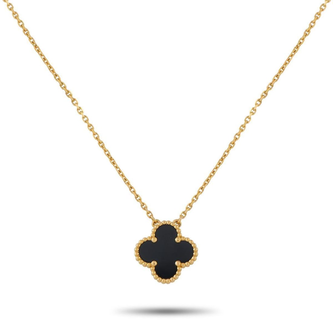 VAN CLEEF & ARPELS ALHAMBRA 18K YELLOW GOLD ONYX NECKLACE: This Van Cleef & Arpels Alhambra necklace will never go out of style. Crafted from 18K Yellow Gold, this instantly recognizable luxury piece features the brands iconic clover-shaped motif in Onyx. The