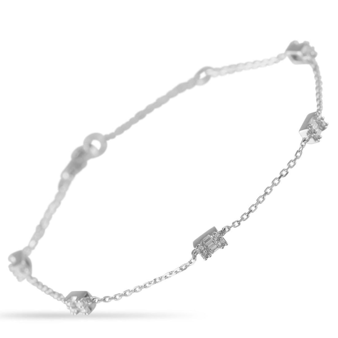 14K WHITE GOLD 0.30CT DIAMOND STATION BRACELET: Add a touch of sparkle to any ensemble with this understated bracelet. Ideal for anyone with a minimalist aesthetic, its crafted from 14K White Gold and showcases Diamond accents with a total weight o