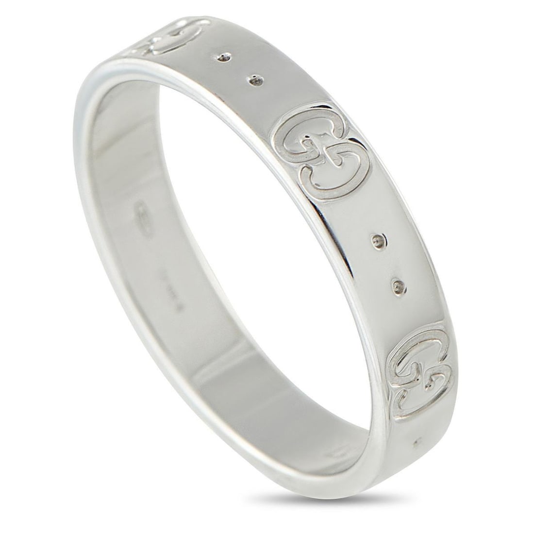 GUCCI ICON 18K WHITE GOLD RING: This Gucci Icon ring is chic and incredibly contemporary. The brands signature GG motif adds a touch of luxury to the sleek, stylish 18K White Gold band. It measures 5mm wide and features a 1mm top he