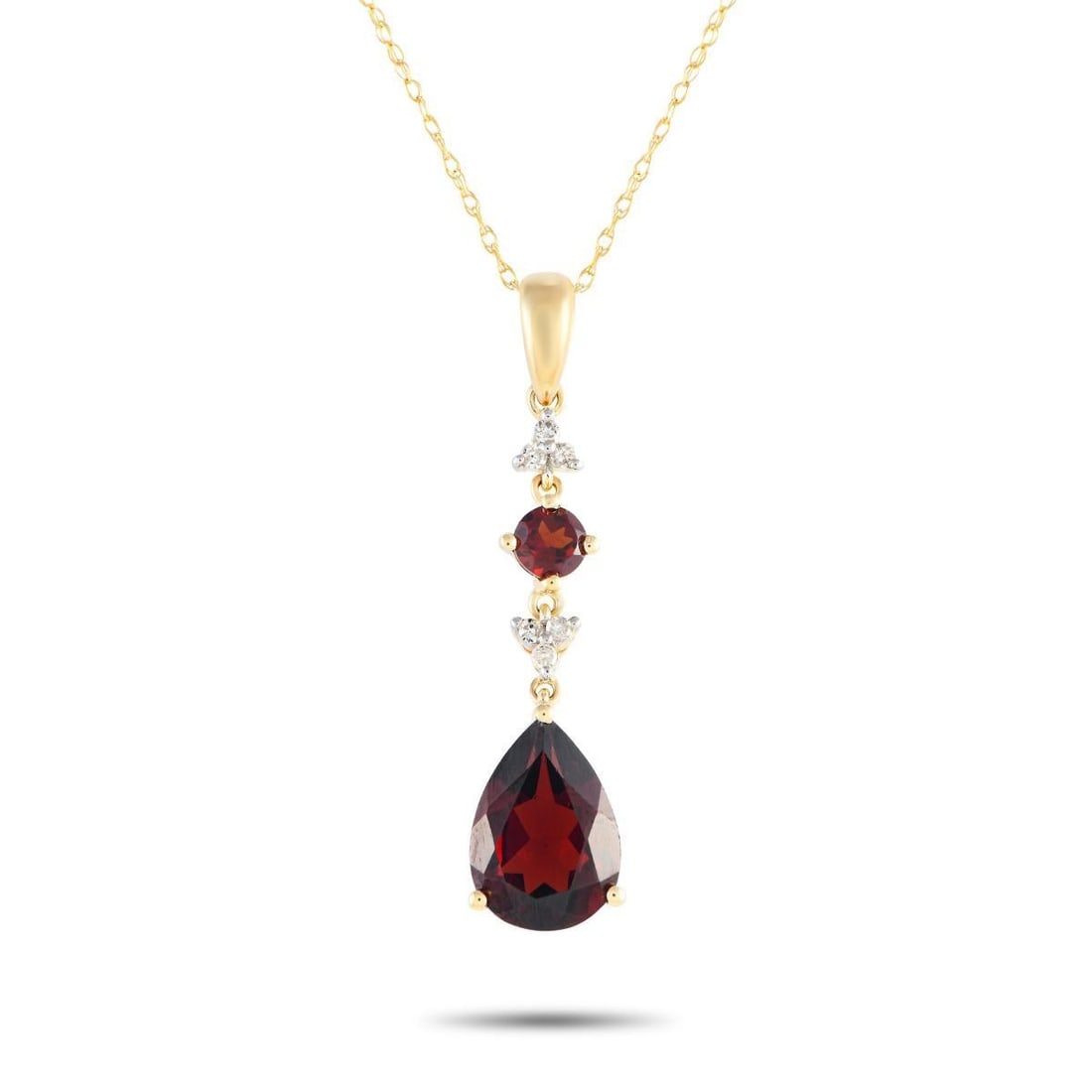 14K YELLOW GOLD 0.05CT DIAMOND AND GARNET PENDANT NECKLACE: Add a touch of sophistication to any ensemble with this simple, elegant necklace. Suspended from an 18 chain, youll find a 14K Yellow Gold pendant measuring 1.25 long and 0.25 wide. Captivating Garnet