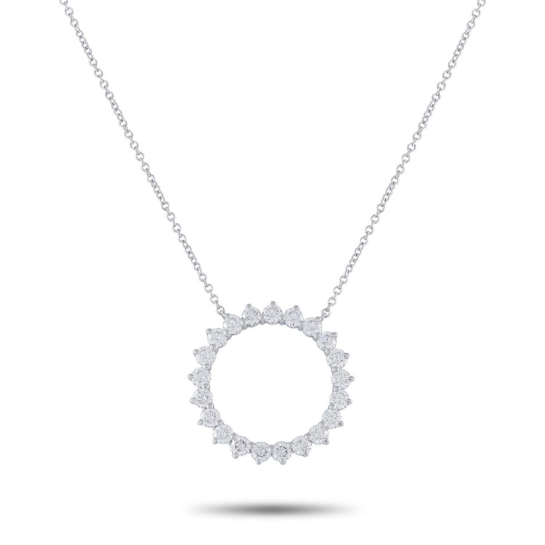 TIFFANY & CO. PLATINUM 1.0CT DIAMOND OPEN CIRCLE PENDANT NECKLACE: This Tiffany & Co. necklace will effortlessly elevate any ensemble. Set in Platinum, the open circle pendant features sparkling Diamonds with a total weight of 1.0 carats. The pendant measures 0.75 ro