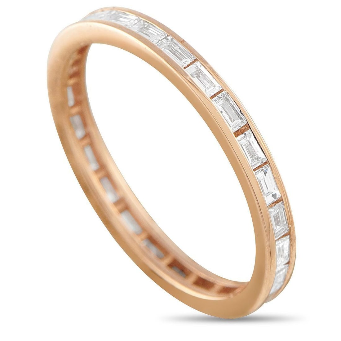 18K ROSE GOLD 0.46CT DIAMOND ETERNITY RING: In 18K rose gold, this 2mm eternity ring is set with baguette diamonds placed continuously around the band in a channel setting. The stones sit side by side, forming a brick-like pattern that gives th