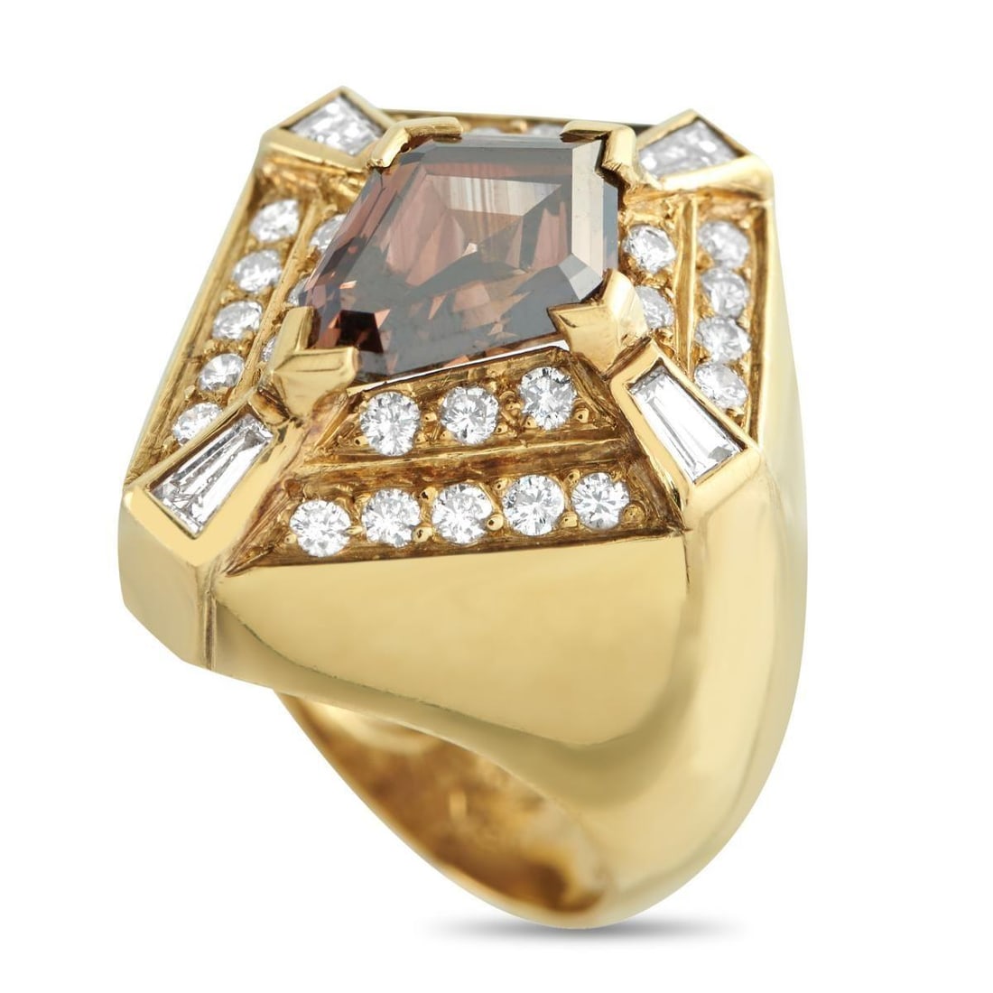 18K YELLOW GOLD 2.75CT DIAMOND KITE RING: A statement ring defined by sharp geometry and confident weight. At the center of this yellow gold ring sits a 2.0 carat cognac diamond, cut in a kite shape and secured by V prongs that protect each c