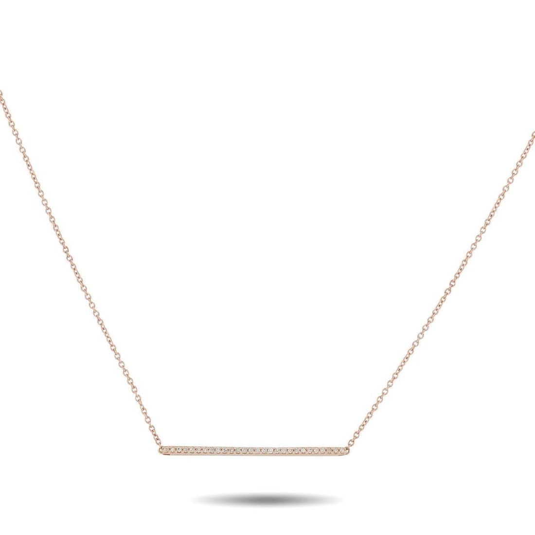 14K ROSE GOLD 0.10CT DIAMOND BAR NECKLACE: Add a subtle touch of sparkle to any outfit with this exquisite necklace. Warm 14K Rose Gold beautifully complements the series of Diamonds totaling 0.10 carats at the center of the pendant. The penda