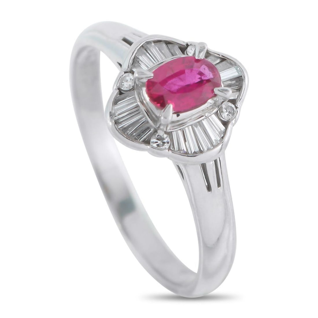 PLATINUM 0.20CT DIAMOND AND RUBY RING: This luxury ring is an understated piece that is ideal for anyone who appreciates minimalist design. At the center, a 0.30 carat Ruby gemstone instantly catches the eye. Diamonds with a total weight o