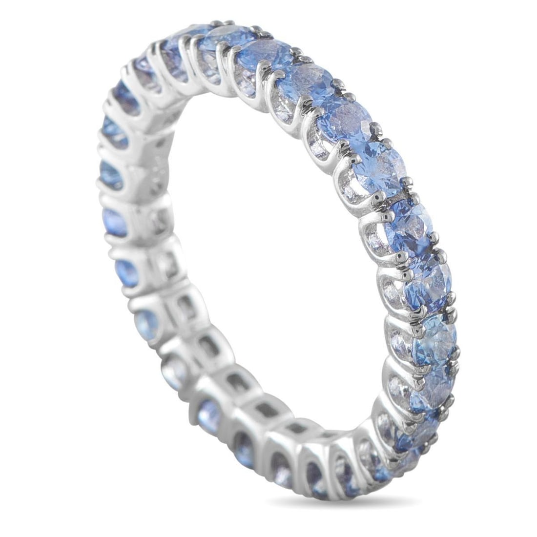 14K WHITE GOLD 3.50CT SAPPHIRE ETERNITY RING: Not a typical eternity band, this 3mm ring carries color across every visible angle. Crafted in 14k white gold, it holds 3.50 carats of sapphires that extend fully around the circumference, uninterrup