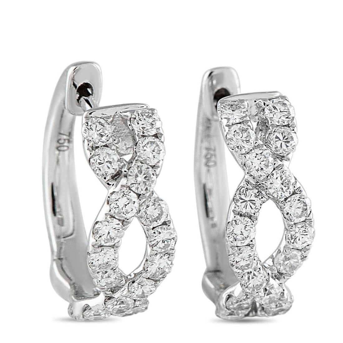 18K WHITE GOLD 0.67CT DIAMOND EARRINGS: An intricate 18K White Gold setting makes these earrings anything but basic. Understated enough for everyday wear, Diamonds with a total weight of 0.67 carats make them seemingly radiate light. Each o