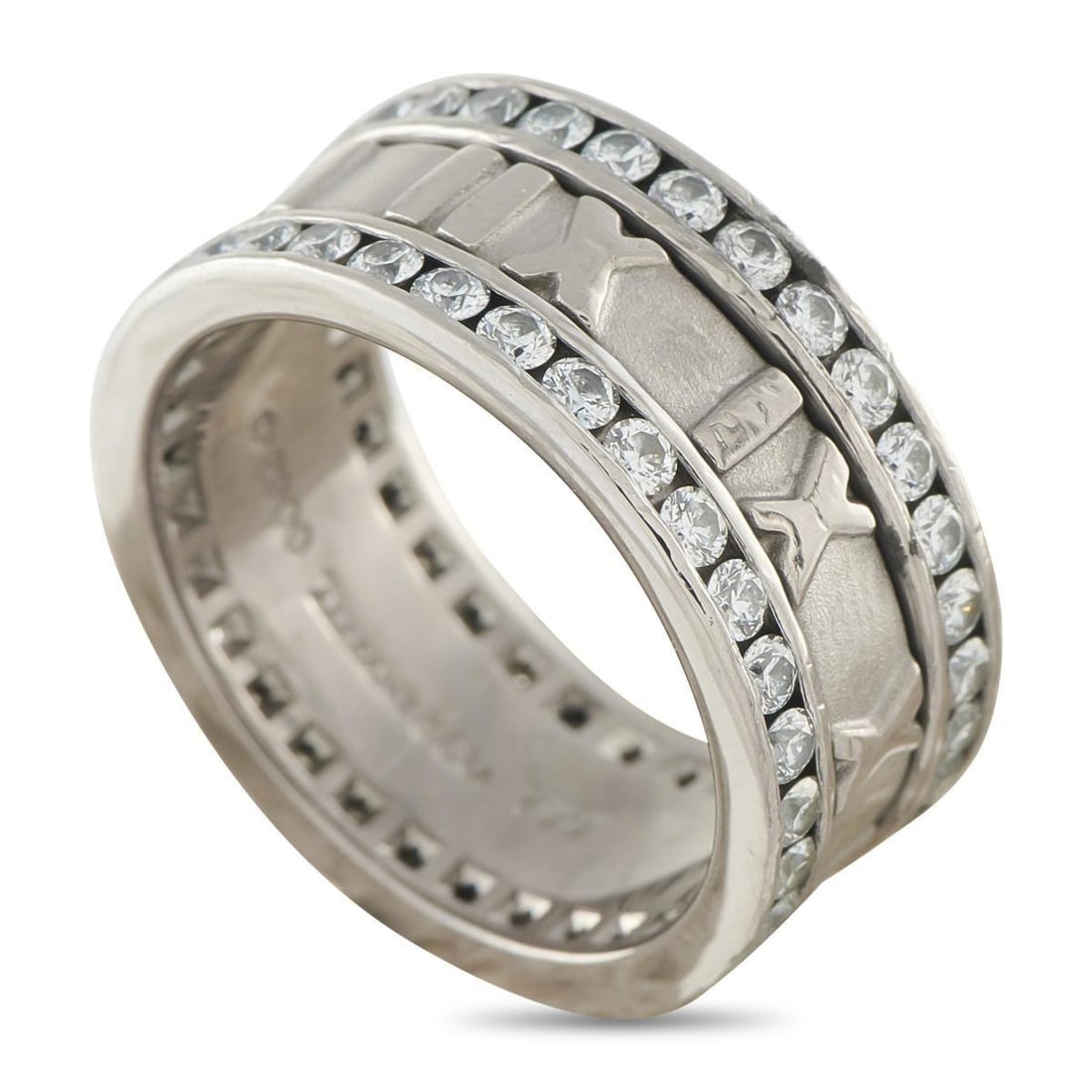 TIFFANY & CO. ATLAS 18K WHITE GOLD 1.65CT DIAMOND ETERNITY RING: Like all pieces from the collection, this Tiffany & Co. Atlas ring features a structural design that is elevated by simple Roman numeral motifs. Diamonds with a total weight of 1.65 carats make a stat