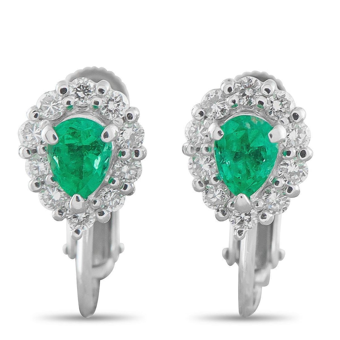 PLATINUM 0.20CT DIAMOND AND EMERALD EARRINGS: Vibrant Emeralds with a total weight of 0.60 carats add color and dimension to these impeccably crafted earrings. Surrounded by Diamonds with a total weight of 0.20 carats, this elegant accessory is t