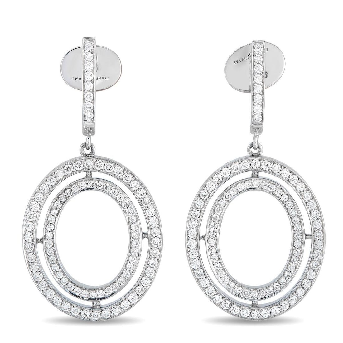 IVANKA TRUMP 18K WHITE GOLD 2.48CT DIAMOND DROP EARRINGS: A stunning circular design makes these Ivanka Trump earrings an exciting addition to any jewelry collection. Bold and incredibly impressive, the 18K White Gold settings shine to life thanks to Diamond