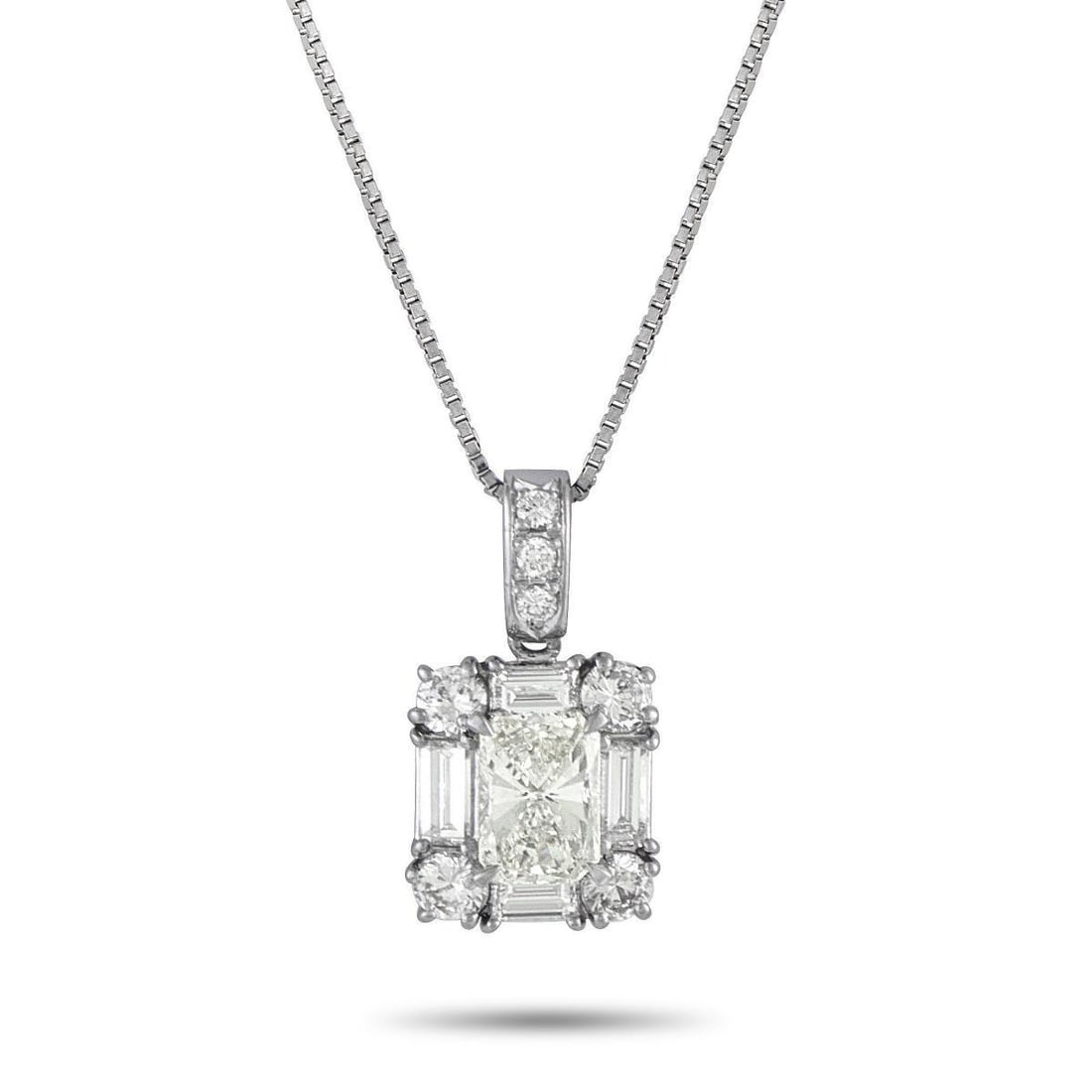 PLATINUM 2.0CT DIAMOND PENDANT NECKLACE: This luxury necklace will provide any ensemble with the perfect amount of sparkle. Ideal for any minimalist, it shines to life thanks to a sparkling 1.0 carat Diamond center stone and additional Diamo