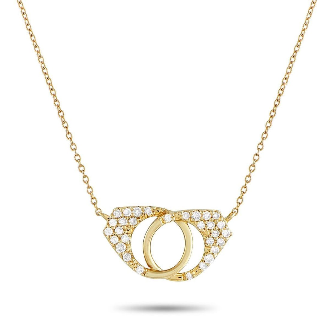 14K YELLOW GOLD 0.15CT DIAMOND HANDCUFF NECKLACE: Lock in a little sparkle with this 14K yellow gold handcuff-inspired necklace. The linked circles are in a polished finish, with pav diamonds on their wider parts. Held by a fine cable chain, this pie