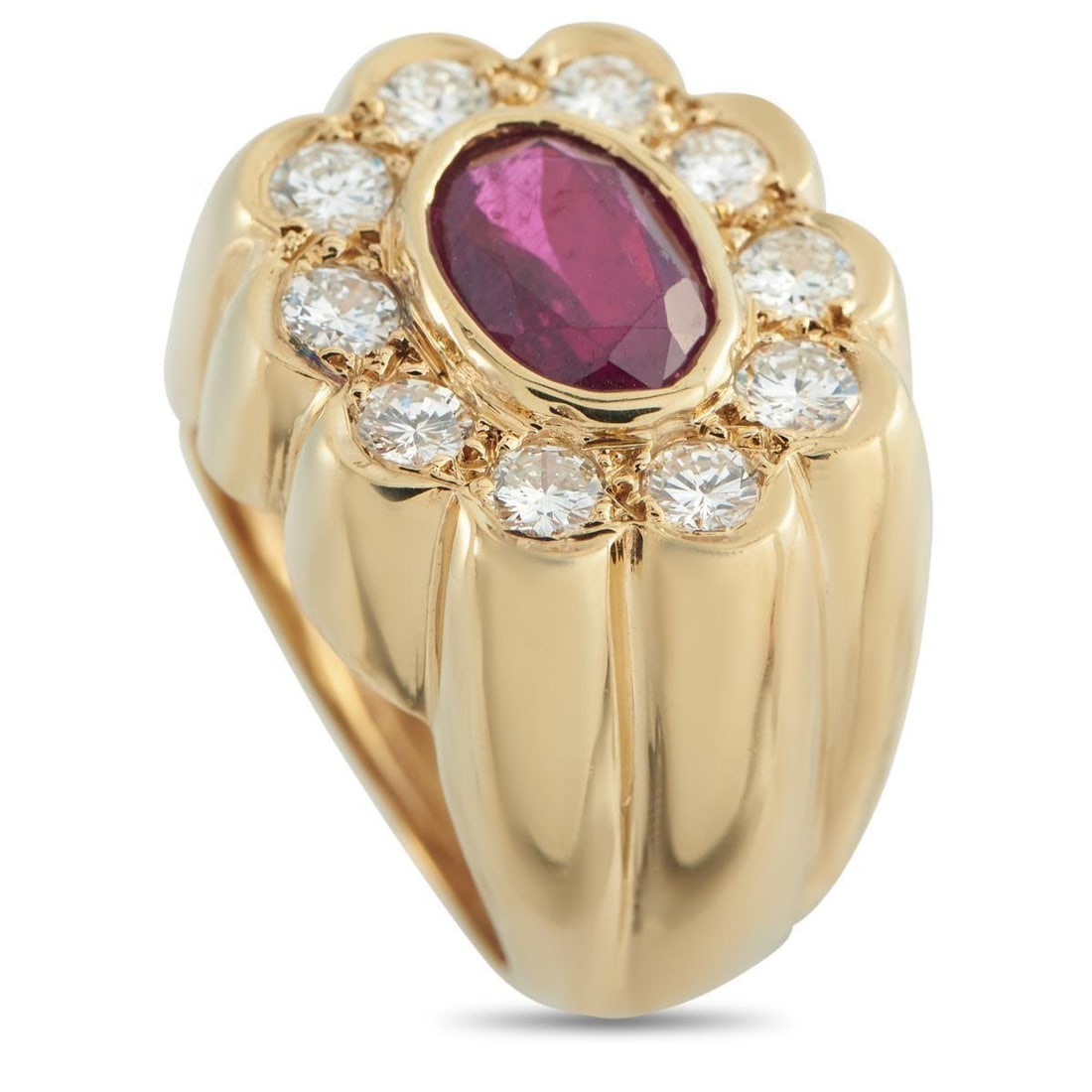18K YELLOW GOLD 1.0CT DIAMOND AND RUBY RING: A sleek 18K Yellow Gold setting makes this luxury ring simply unforgettable. At the center, a 1.95 carat Ruby adds a stylish pop of color to the overall design. Diamonds totaling 1.0 carats surround t