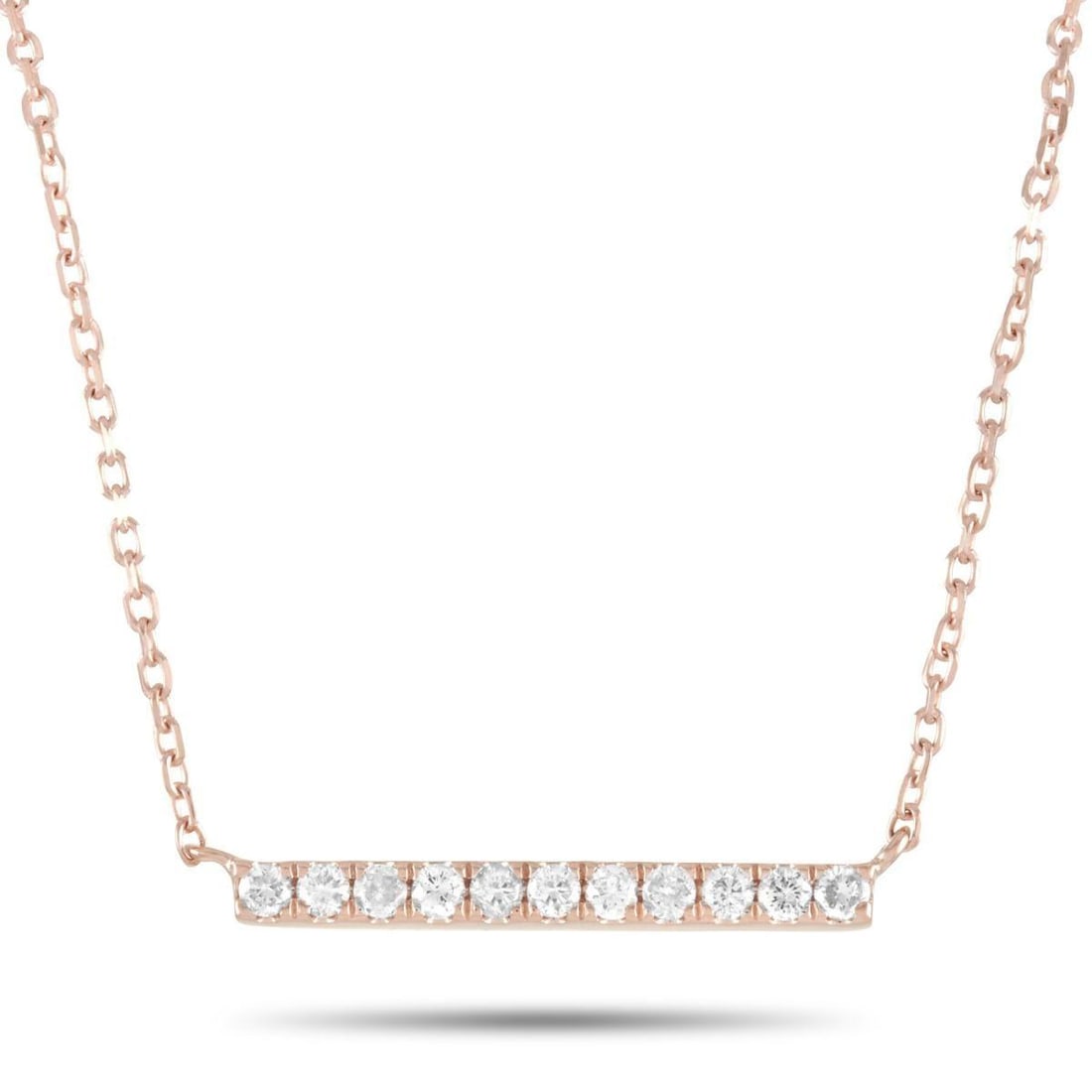 14K ROSE GOLD 0.10 CT DIAMOND PENDANT NECKLACE: This necklace is crafted from 14K rose gold and weighs 1.6 grams. It is presented with a 15 chain and boasts a pendant that measures 0.07 in length and 0.63 in width. The necklace is set with diamonds