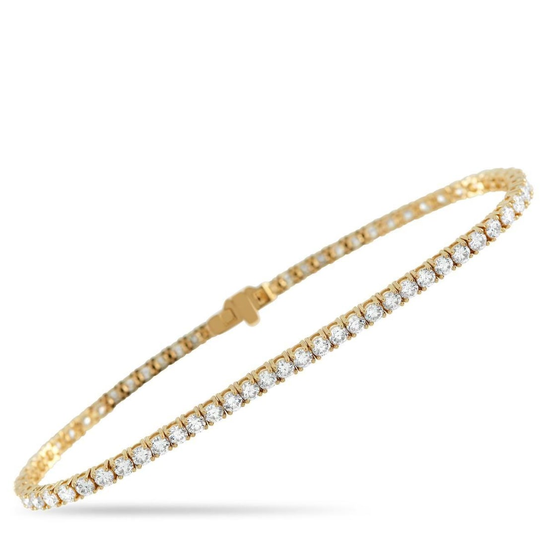18K YELLOW GOLD 4.62CT DIAMOND TENNIS BRACELET: In this tennis bracelet, diamonds totaling 4.62 carats are set close enough for a smooth surface, yet spaced just right so light slips between them. When the ring moves, the diamonds catch the light a