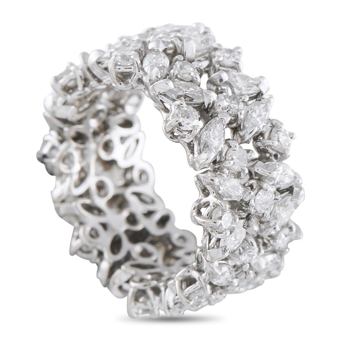 PLATINUM 2.90CT DIAMOND CLUSTER ETERNITY RING: Some eternity rings reject uniformity altogether. In this piece, round and marquise diamonds sit in varied orientations to create a dense yet luminous thicket. Despite the organic layout, the coverage