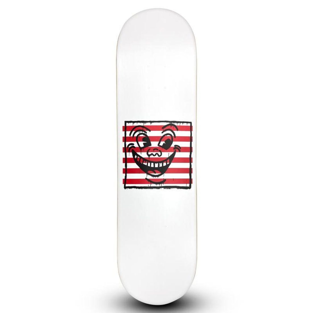 Keith Haring (1958-1990), "Untitled (Smile On Stripes)" Skateboard, Plate Signed with Letter of: Untitled (Smile On Stripes) is a skateboard by Keith Haring (1958-1990), bearing the plate signature of the artist inverso. Includes Letter of Authenticity. Measures approx. 32" x 8.5" (skateboard). R