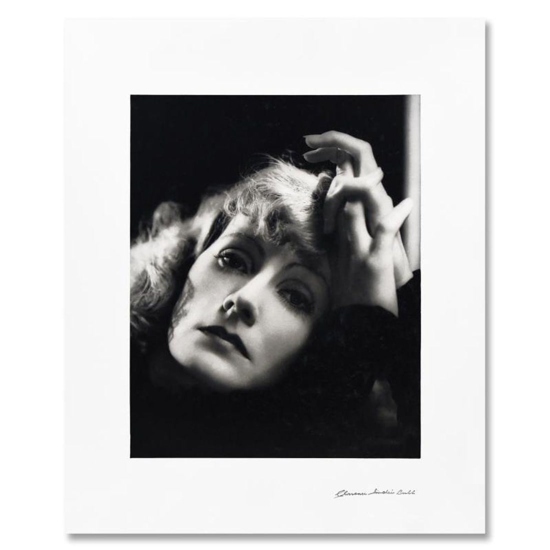 Clarence Sinclair Bull (1895-1979), "Greta Garbo" Limited Edition Photograph, Numbered and Stamp: Greta Garbo is a limited edition photograph on paper by Clarence Sinclair Bull (1895-1979), numbered and stamp signed by the estate. This photograph is from the original negative. This piece bears inv