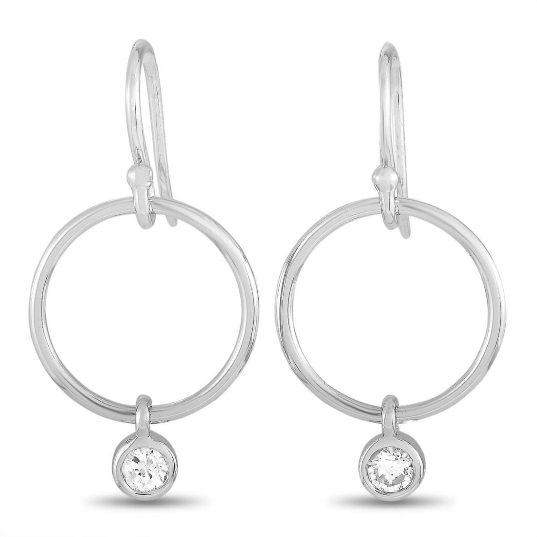 14K WHITE GOLD 0.32 CT DIAMOND EARRINGS: These earrings are made of 14K white gold and embellished with diamonds that total 0.32 carats. The earrings measure 1.25 in length and 0.65 in width and each of the two weighs 1.4 grams.The pair is o