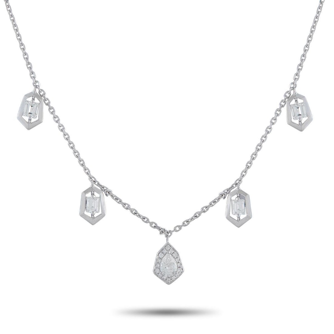 18K WHITE GOLD 1.37CT DIAMOND NECKLACE: This impeccably crated necklace is both understated and incredibly dynamic in design. A series of hanging pendants add movement to this graceful piece, while sparkling Diamonds with a total weight of