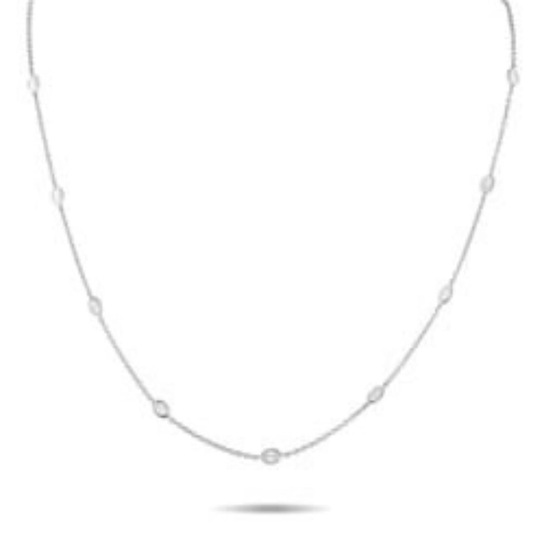 18K WHITE GOLD 1.50CT DIAMOND STATION NECKLACE: This classically elegant necklace will never go out of style. Crafted from 18K White Gold, a series of oval-cut Diamonds with a total weight of 1.50 carats provide plenty of sparkle. It measures 18 lo