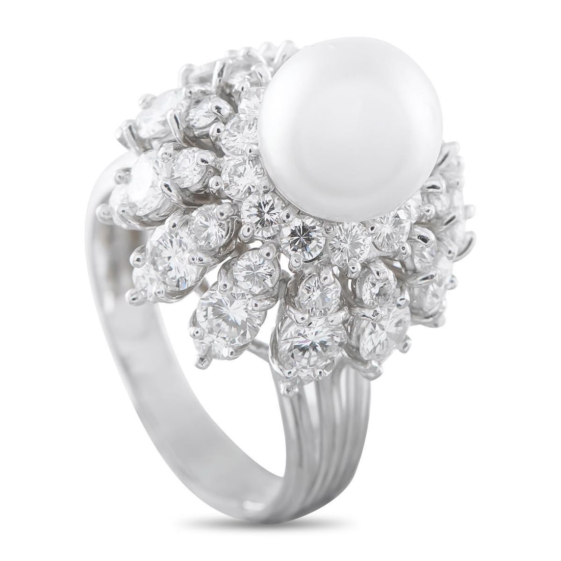PLATINUM 2.76CT DIAMOND AND PEARL RING: A 9mm Pearl offers a stunning alternative to a traditional center stone on this impressive luxury ring. Sparkling Diamonds with a total weight of 2.76 carats surround the center stone, further elevati