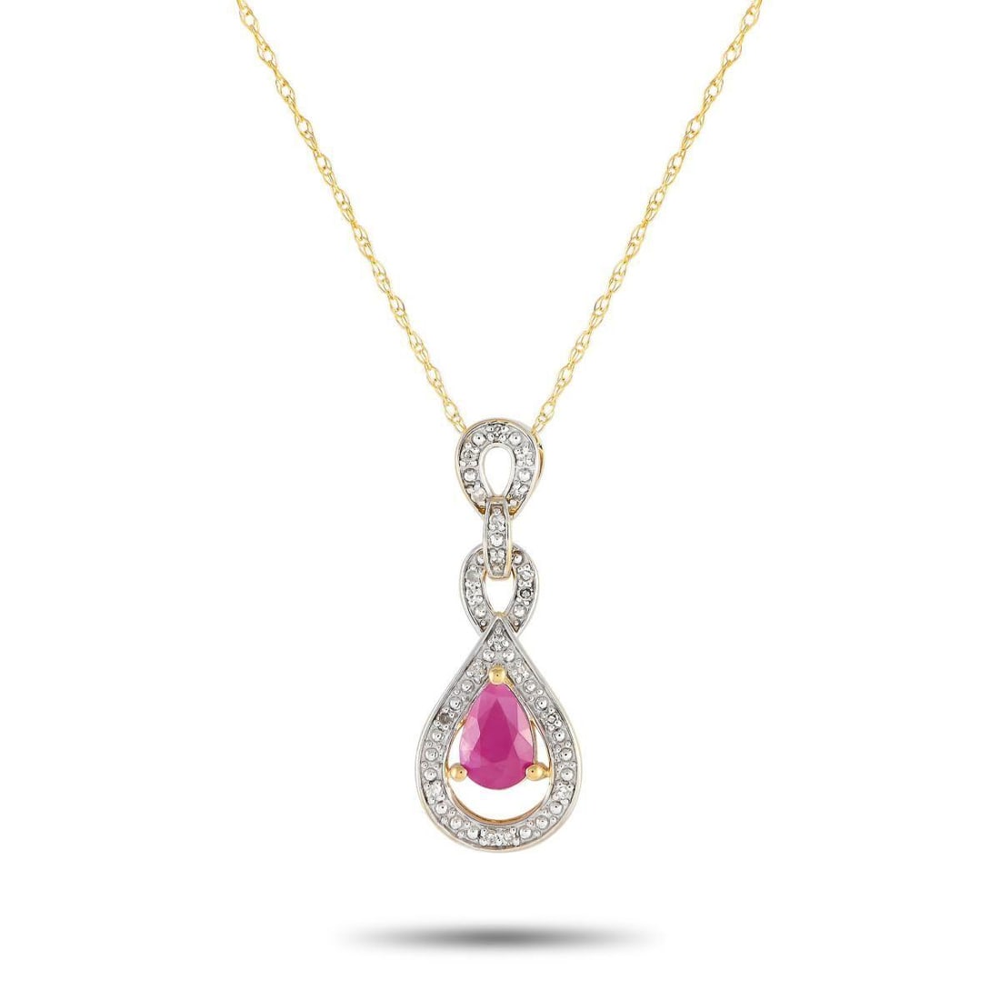 14K YELLOW GOLD 0.08CT DIAMOND AND RUBY NECKLACE: An intricate pendant measuring 0.85 long and 0.45 wide is suspended from an 18 chain on this elegant 14K yellow gold necklace. Ideal for any occasion, it comes complete with a captivating Ruby center