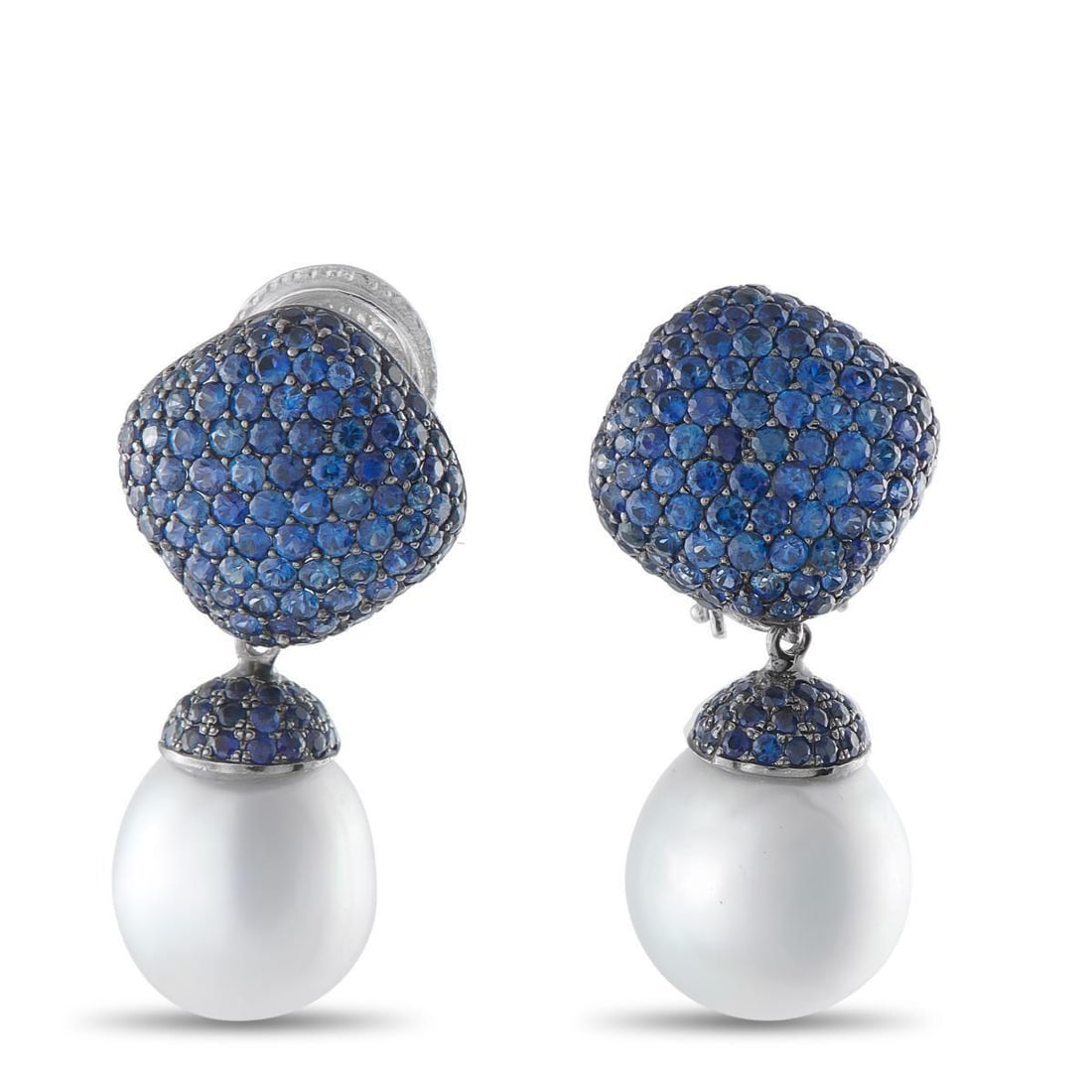 YVEL 18K WHITE GOLD 7.0CT SAPPHIRE AND PEARL EARRINGS: These Yvel earrings will make any ensemble even more exquisite. Vibrant Sapphire gemstones with a total weight of 7.0 carats allow them to come alive with color. Dangling below, a pair of 14.5mm Pearl