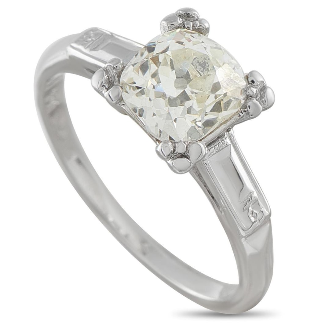 ANTIQUE 14K WHITE GOLD 1.05CT DIAMOND RING: Here is an antique 14k white gold ring centered on a 1.05-carat cushion-shaped diamond. The lone stone is secured at each corner by a trio of prongs, creating a softened square outline that frames the