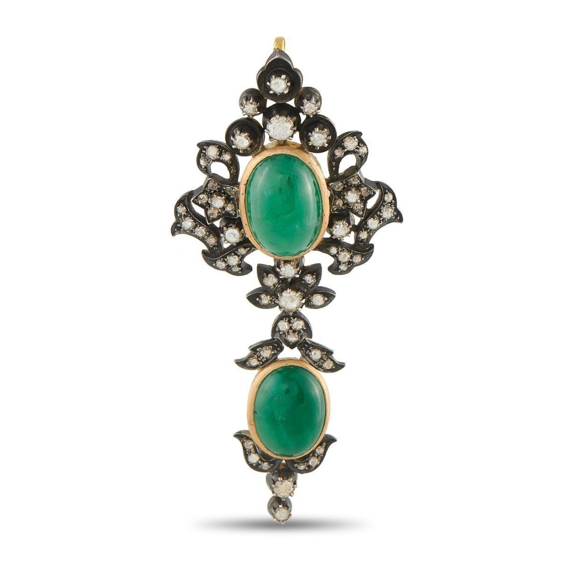 ANTIQUE 18K YELLOW GOLD AND SILVER 2.50CT DIAMOND AND EMERALD PENDANT: An intricate two-toned setting crafted from 18K Yellow Gold and Silver provides a stunning foundation for this luxury pendant. Emerald cabochons with a total weight of 32.0 carats make it simply mesme