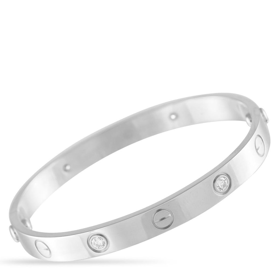 CARTIER LOVE 18K WHITE GOLD 4 DIAMOND BRACELET SIZE 16: This Cartier LOVE bracelet is a luxury piece that is ideal for everyday wear. On this iconic accessory, a series of 4 Diamonds are paired with the brand's classic screw motif. This Size 16 bracelet me