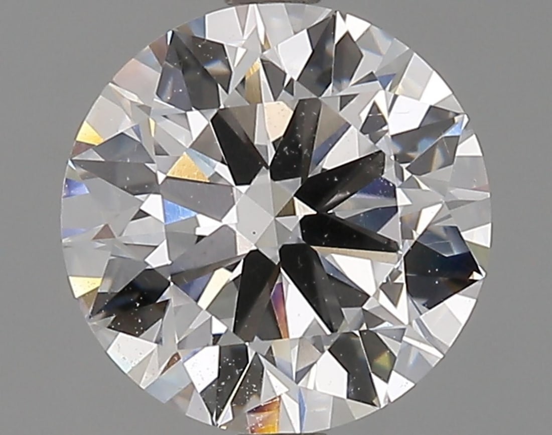 Lab Grown 2.5 ct, Color E/VS1 IGI Graded Diamond: Lab/Natural Diamond: Lab Carat Weight: 2.5 Color Grade: E Clarity Grade: VS1 Model: Round Brilliant Fluorescence: None Polish: Excellent Symmetry: Excellent Cut Grade: Ideal Size: 8.73 - 8.76 X 5.24 C