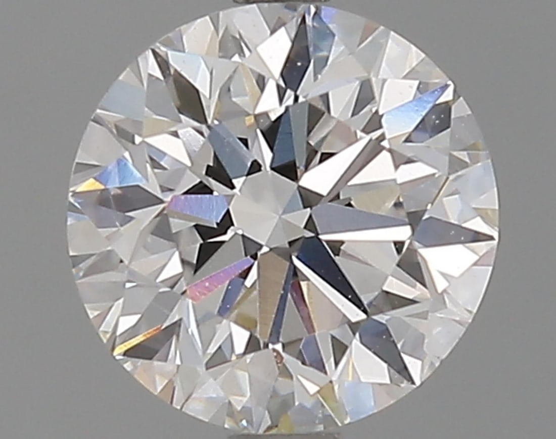 Lab Grown 1.7 ct, Color E/VS1 IGI Graded Diamond: Lab/Natural Diamond: Lab Carat Weight: 1.7 Color Grade: E Clarity Grade: VS1 Model: Round Brilliant Fluorescence: None Polish: Excellent Symmetry: Excellent Cut Grade: Excellent Size: 7.49 - 7.53 X 4.