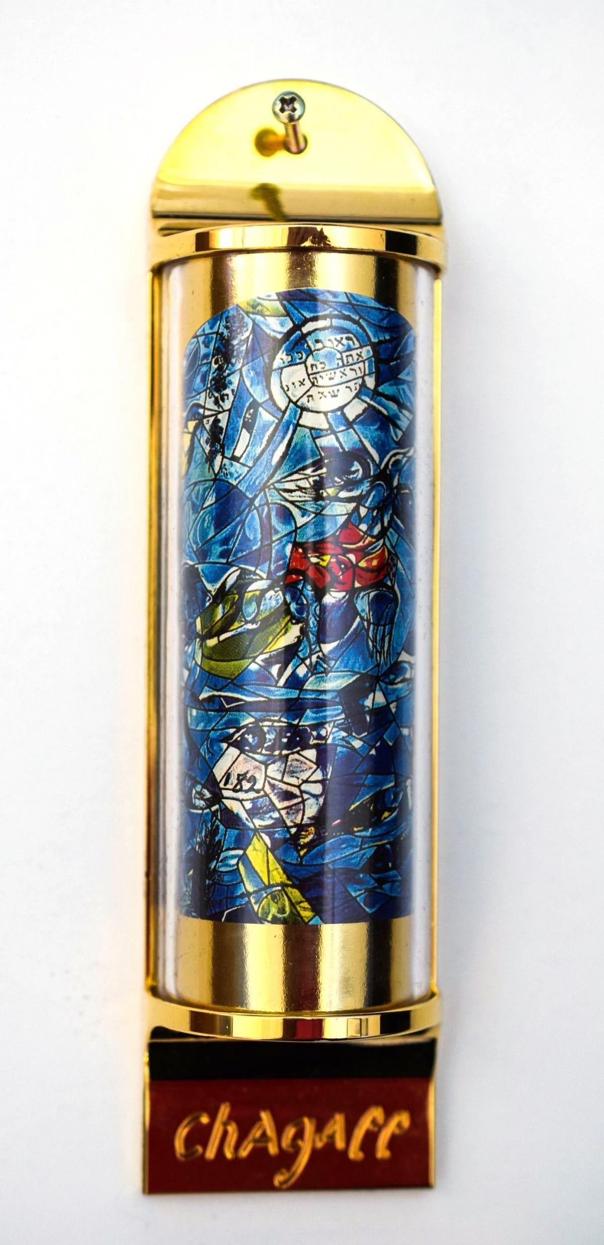 Marc Chagall- Mezuzah - silkscreen on 24K gold plated bronze "12 Tribes Hadassah Windows - Reuben": Artist: Marc Chagall. Medium: Mezuzah - silkscreen on 24K gold plated bronze. Title: 12 Tribes Hadassah Windows - Reuben. Size: 5" x 1.5". Certificate of Authenticity: Is included. Additional: Limited