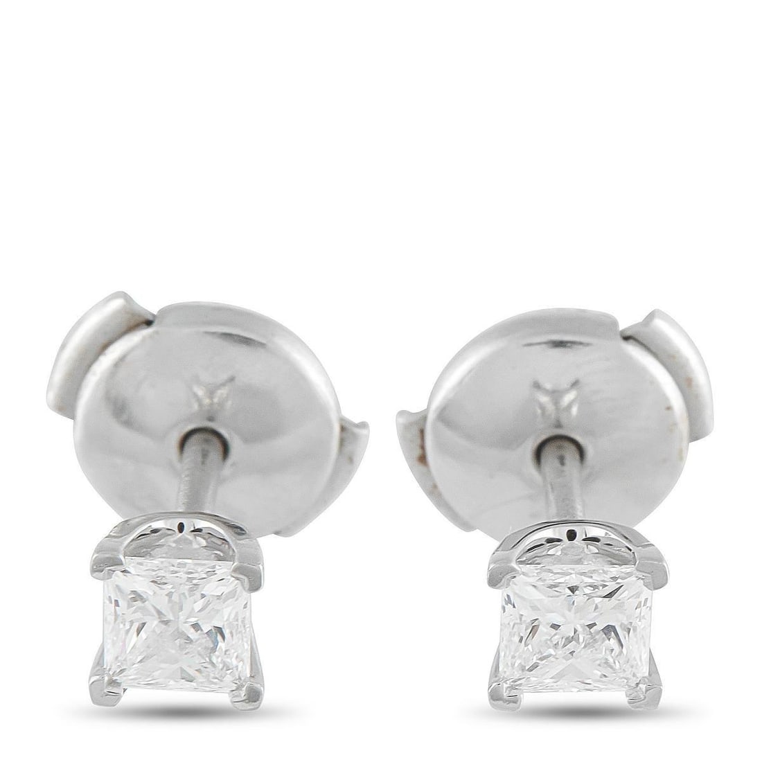 TIFFANY & CO. PLATINUM 0.64CT DIAMOND STUD EARRINGS: These simple, elegant Tiffany & Co. stud earrings are ideal for any occasion. A staple piece of any jewelry collection, they come complete with square-cut Diamonds totaling 0.64 carats in a classic 4-