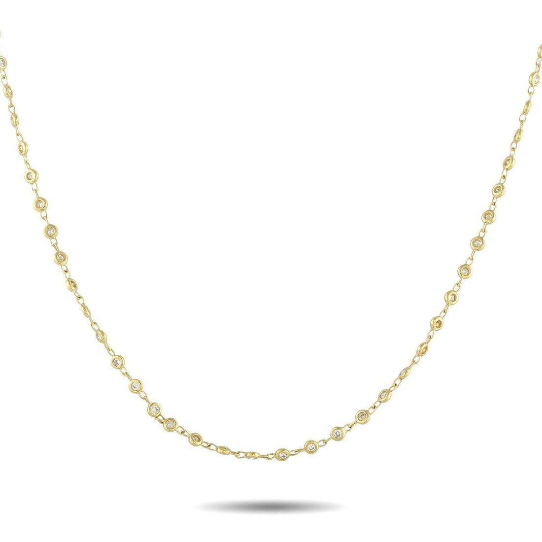 18K YELLOW GOLD 2.0CT DIAMOND NECKLACE: This understated necklace will look elegant no matter if its worn alone or layered with other pieces. Crafted from 18K Yellow Gold, the simple design comes to life thanks to bezel-set Diamonds with a