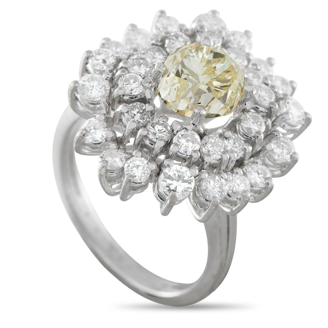 18K WHITE GOLD 3.91CT DIAMOND RING: This luxury ring effortlessly emanates light. A 2.31 carat Diamond center stone adds a touch of warmth to the classically elegant design. Its surrounded by additional Diamond accents totaling 1.60 car