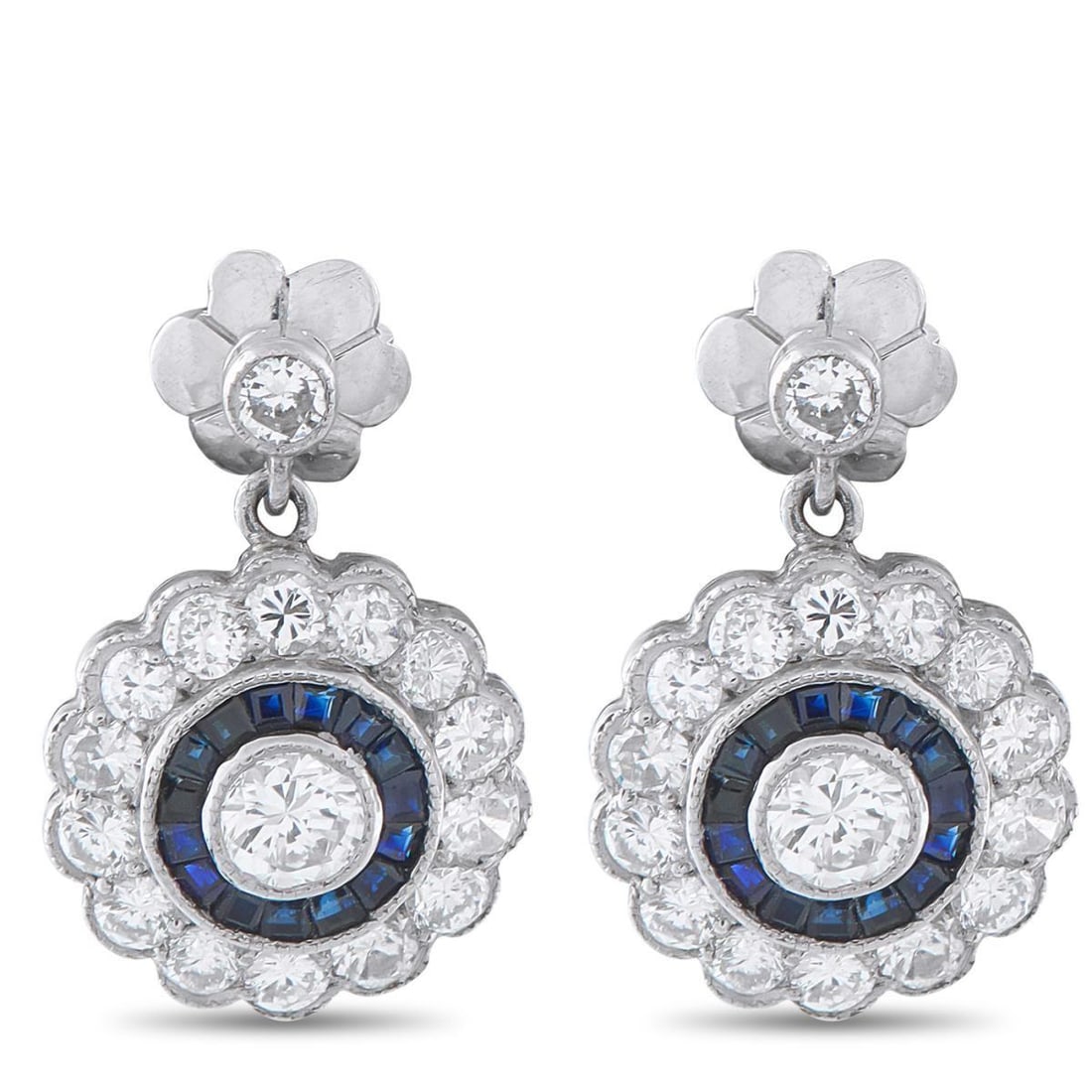 PLATINUM 1.66CT DIAMOND AND SAPPHIRE EARRINGS: These earrings are as elegant as they are effortless. Set in Platinum, they beautifully showcase sparkling Diamonds with a total weight of 1.66 carats. Sapphire accents provide a stylish pop of color.