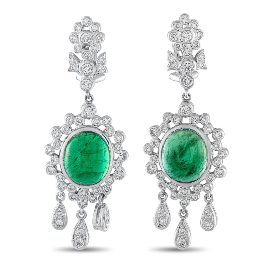 18K WHITE GOLD 1.10CT DIAMOND AND EMERALD EARRINGS: These intricate earrings will add a touch of luxury to any outfit or occasion. The delicate 18K White Gold settings showcase sparkling Diamonds with a total weight of 1.10 carats. At the center, Emera