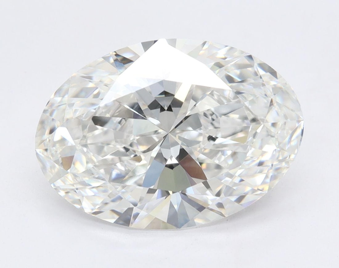 Lab Grown 3.02 ct, Color E/VS2 IGI Graded Diamond: Lab/Natural Diamond: Lab Carat Weight: 3.02 Color Grade: E Clarity Grade: VS2 Model: Oval Fluorescence: None Polish: Excellent Symmetry: Excellent Depth: 64.7 Table: 60 Size: 11.37 X 8.07 X 5.22 Certi