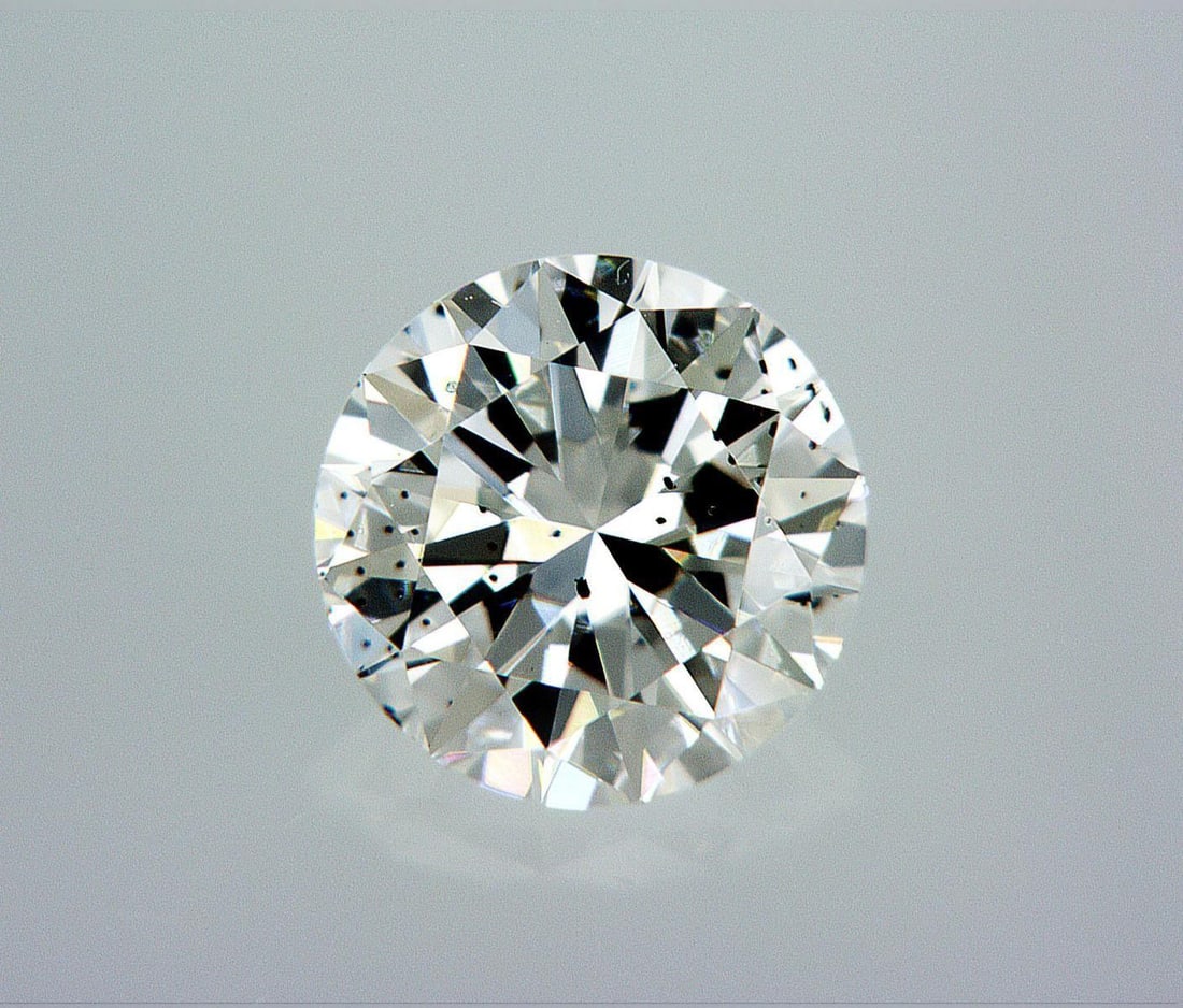 Natural 0.5 ct, Color G/SI2 GIA Graded Diamond: Lab/Natural Diamond: Natural Carat Weight: 0.5 Color Grade: G Clarity Grade: SI2 Model: Round Brilliant Fluorescence: Faint Polish: Excellent Symmetry: Very Good Cut Grade: Good Size: 5.04 - 5.07 X 3.
