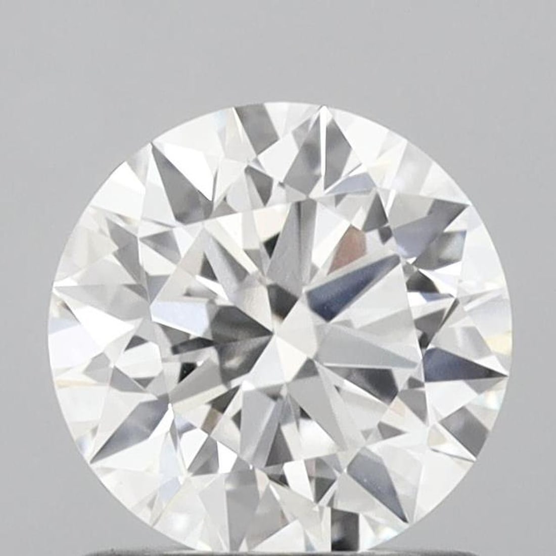 Lab Grown 1.05 ct, Color D/VVS2 IGI Graded Diamond: Lab/Natural Diamond: Lab Carat Weight: 1.05 Color Grade: D Clarity Grade: VVS2 Model: Round Fluorescence: N Polish: EXCELLENT Symmetry: EXCELLENT Depth: 60.9 Table: 59 Cut Grade: IDEAL Size: 6.52-6.55