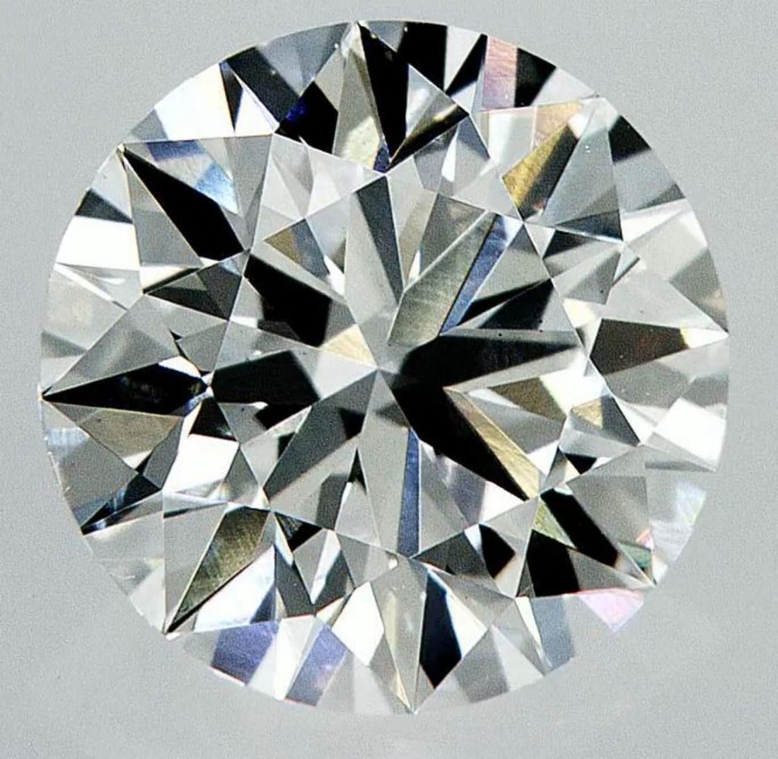 Lab Grown 1.97 ct, Color E/VS1 IGI Graded Diamond: Lab/Natural Diamond: Lab Carat Weight: 1.97 Color Grade: E Clarity Grade: VS1 Model: Round Brilliant Fluorescence: None Polish: Excellent Symmetry: Excellent Cut Grade: Ideal Size: 8.09 - 8.12 X 4.90 