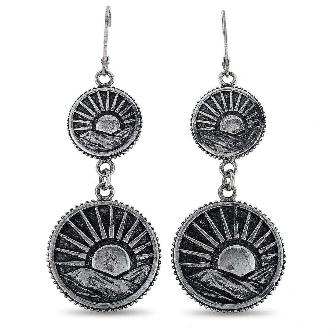 KING BABY SILVER SUN CONCHO EARRINGS: These King Baby earrings are made of silver and each of the two weighs 14.1 grams, measuring 2.62 in length and 0.90 in width.The pair is offered in brand new condition and includes the manufacturers 