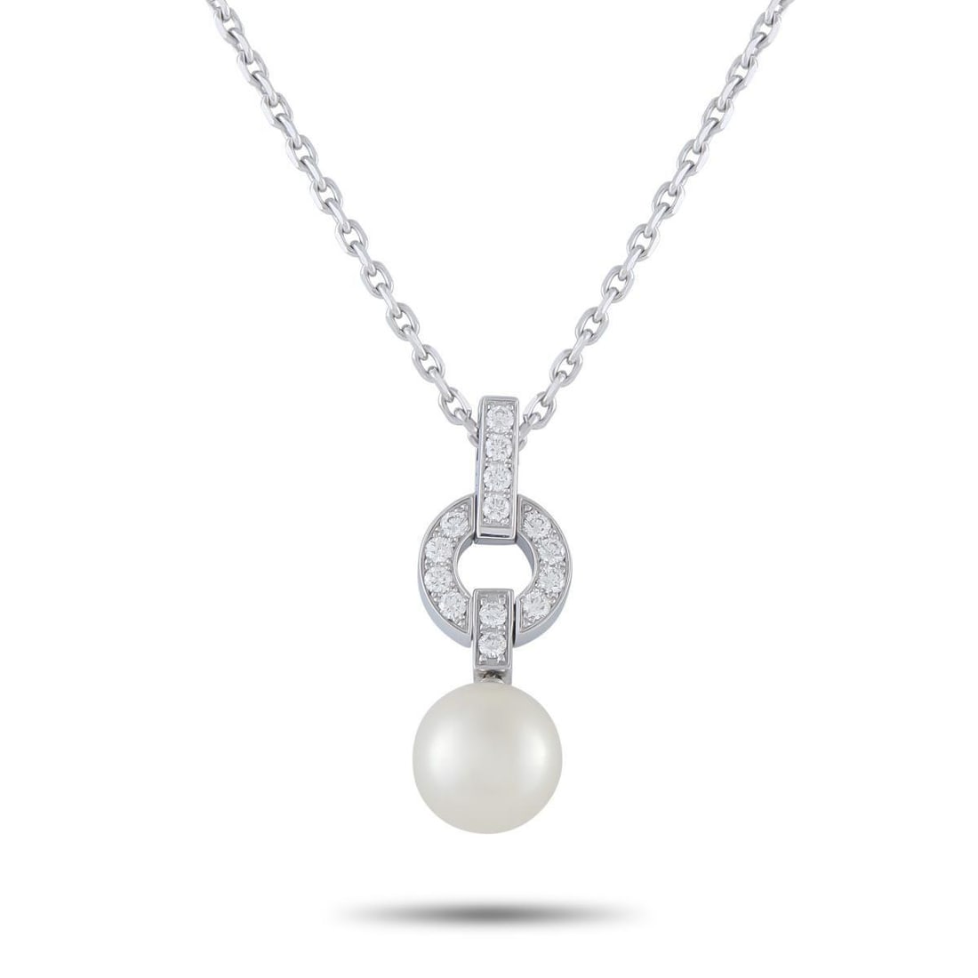 CARTIER HIMALIA 18K WHITE GOLD DIAMOND AND PEARL PENDANT NECKLACE: This elegant Cartier Himalia necklace exudes obvious luxury. Ideal for anyone with a minimalist aesthetic, the collections signature motif makes a statement thanks to inset Diamonds. A hanging Pearl a
