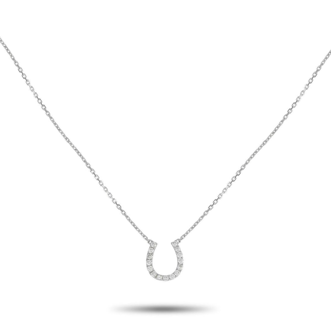 14K WHITE GOLD 0.30CT DIAMOND HORSESHOE NECKLACE: This exquisitely crafted necklace is poised to bring you plenty of good luck. A horseshoe shaped pendant measuring 0.50 long by 0.40 wide shines to life thanks to a series of sparkling Diamonds totali