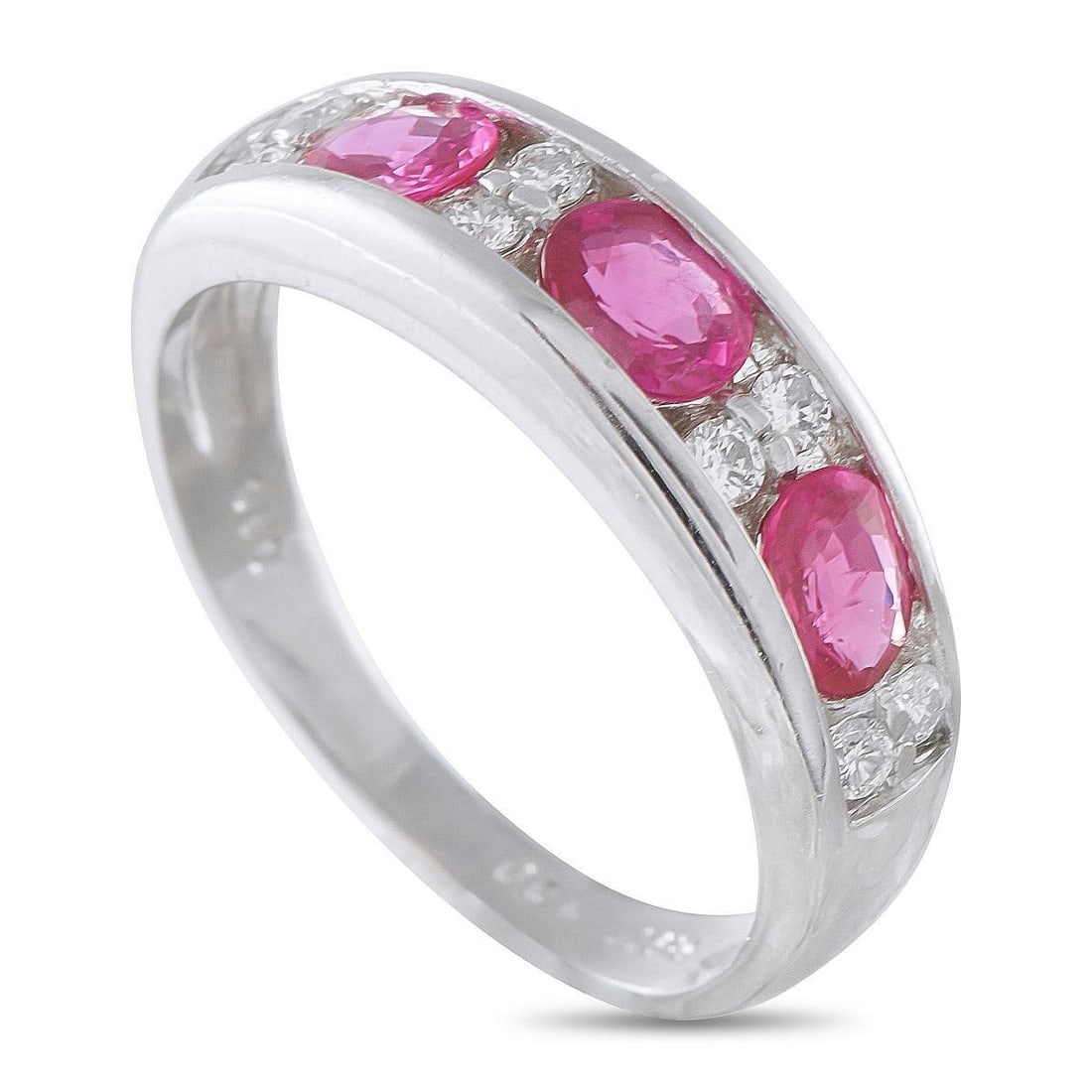 PLATINUM 0.16CT DIAMOND AND SAPPHIRE RING: This ring will look elegant no matter if it is worn alone or stacked with other luxury pieces. Pink Sapphires totaling 1.0 carats and 0.16 carats shine bright from their place within the sleek channel