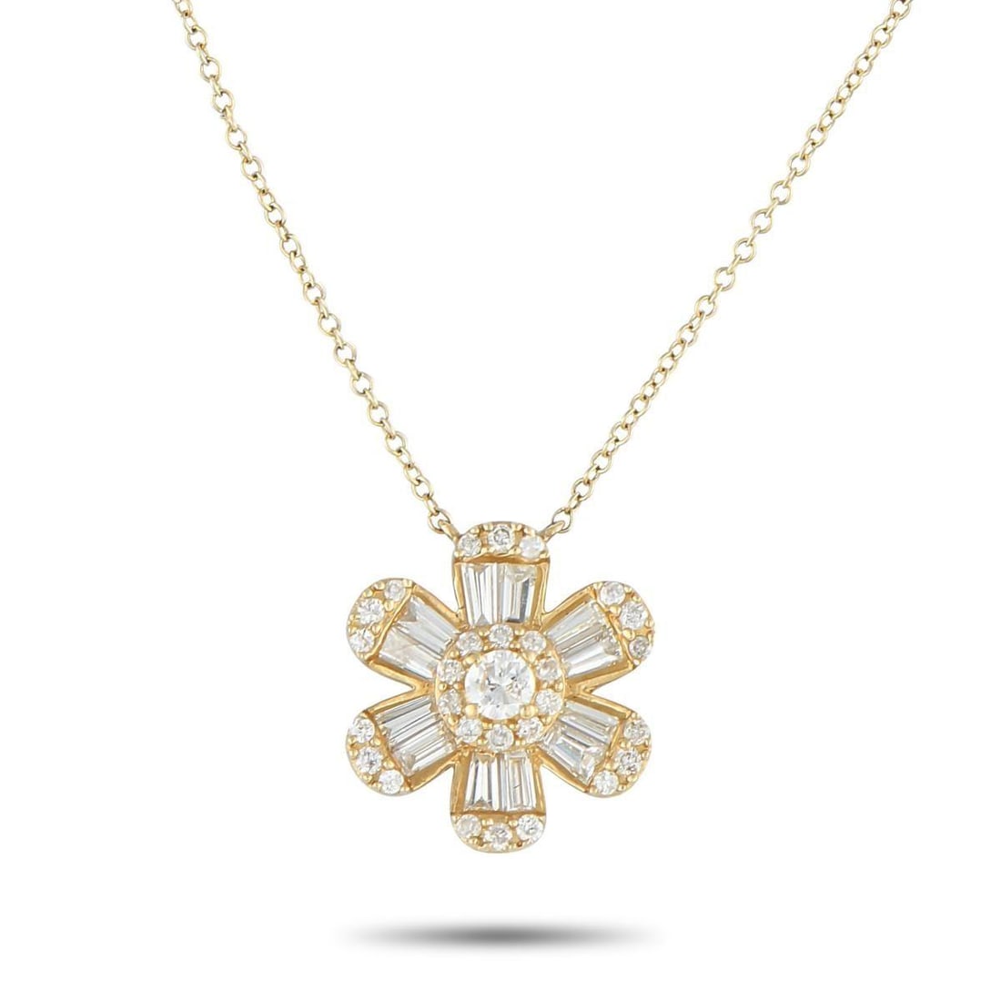 14K YELLOW GOLD 0.80CT DIAMOND PENDANT NECKLACE: Diamonds with a total weight of 0.80 carats allow this necklace to effortlessly catch the light. The stylish starburst-shaped pendant measures 0.50 round and is suspended from a 16 chain. Crafted from
