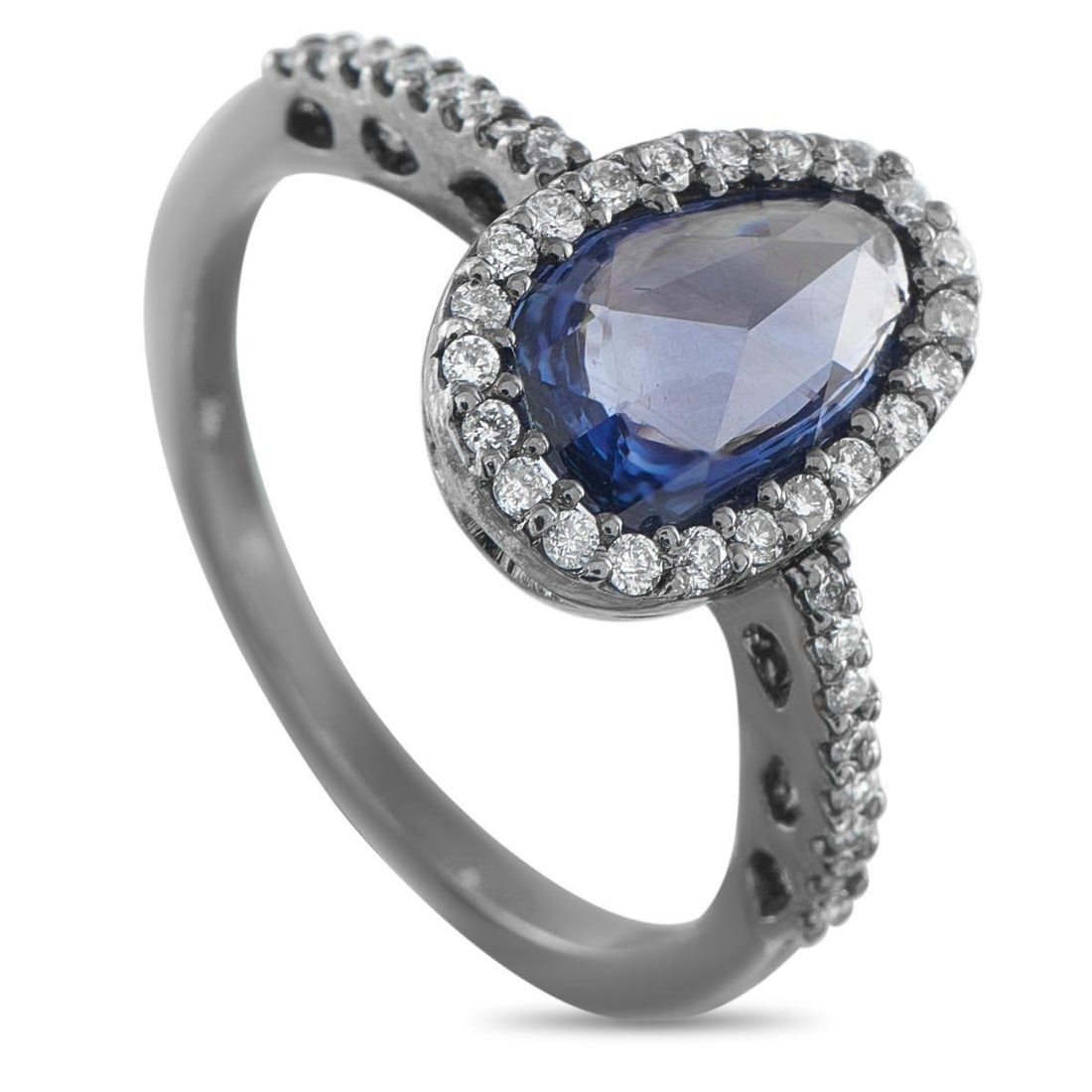 18K WHITE GOLD 0.40CT DIAMOND AND SAPPHIRE COCKTAIL RING: Light in weight yet distinct in attitude, this ring effortlessly balances delicacy with edge. The ring holds a 1.55-carat sapphire shaped in a soft, egg-like oval. A halo of round diamonds frames the 